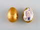 Two porcelain Easter eggs with hand-painted flowers and gold decoration. Swedish 
design, dated 1981.
