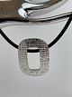 Natural rubber chain with "buckle" pendant from 
Toftegaard, designed by Traudel Toftegaard, unused