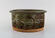 European studio ceramicist. Bowl in glazed ceramics. Late 20th century.
