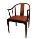 Hans J. Wegner; PP66 The China chair, cherry wood with red/brown leather