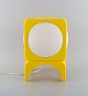 Scandinavian designer. Retro table lamp in white and yellow plastic. 1970