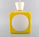 Scandinavian designer. Retro ceiling pendant in white and yellow plastic. 
1970