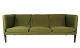 Three seater sofa, Model AP 18S, upholstered with green wool fabric and legs of 
dark wood, designed by Hans J. Wegner from the 1960s. 
5000m2 showroom.