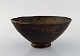 Eli Keller (b. 1942), Sweden. Unique bowl in glazed stoneware. Japanese style. 
Beautiful metallic glaze. 21st Century.
