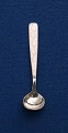 Salt spoon of Danish sterling silver with light beige enamel