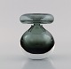 Nanny Still (1926-2009) for Riihimäen Lasi. Rare vase in gray and clear 
mouth-blown art glass. Finnish design, 1960s.
