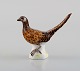 Antique Meissen miniature porcelain figurine. Pheasant. Late 19th century.
