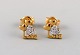 Danish jeweler. A pair of ear studs in 14 carat gold adorned with bright 
diamonds. Late 20th century.
