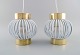 Two designer 
pendants in 
brass and white 
plastic. 1960s 
...