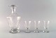 Saint-Louis, France. Sherry set in clear mouth blown crystal glass. Consisting 
of three sherry glasses and a carafe. 1930s.
