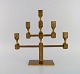 Gusum Metal. Large five-armed candlestick in brass. Swedish design, 1980s.
