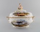 L'Art presents: Large antique Meissen lidded tureen in hand-painted porcelain. Military scenes and putti with ...