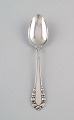 Georg Jensen Lily of the Valley tablespoon in sterling silver. Eight pieces in 
stock.
