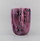 Vallauris vase in glazed ceramics. Beautiful crystal glaze in violet tones. 
France, 1960s.

