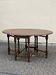 Gate-leg table / folding table in oak with twisted 
legs.