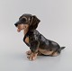 Stor Royal Copenhagen porcelænsfigur. Gravhund. Modelnummer 856. Dateret 1964.
