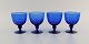 Monica Bratt for Reijmyre. Four wine glasses in blue mouth blown art glass. 
Swedish design, mid 20th century.
