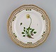 Royal Copenhagen Flora Danica openwork plate in hand-painted porcelain with 
flowers and gold decoration. Model number 20/3554.
