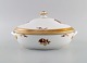 Royal Copenhagen Golden Basket lidded tureen in porcelain with flowers and gold 
decoration. Model number 595/9348. Early 20th century.
