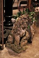 Decorative, old sandstone lion with a really nice patina. 
Height: 41cm...