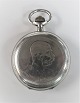 Lundin Antique presents: Double capsulated silver pocket watch. JWC. Front: Emperor Franz Joseph. Back: ...