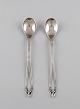 Two early and rare Georg Jensen ice tea spoons. Dated 1904-1908.
