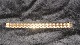 Antik Huset 
presents: 
Elegant 
Bracelet 18 
carat gold
Stamped 750
Length 18.5 cm
Width 16.20 mm
Thickness ...