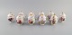10 antique Rörstrand porcelain cream cups with hand-painted flowers and gold 
decoration. Approx. 1900.
