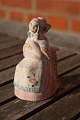 Hjorth Danish ceramics figurine, woman on a chair 
in suit