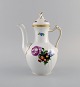 Royal Copenhagen Saxon Flower coffee pot in hand-painted porcelain with flowers 
and gold decoration. Model number 493/1517. Dated 1939.
