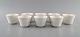 Wilhelm Kåge for Gustavsberg. Eight herb pots in white glazed porcelain. Swedish 
design, 1960s.
