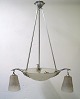 Muller Frères, Luneville. Large impressive chandelier in wrought iron designed 
with foliage with four screens in mouth-blown frosted art glass. 1930s / 40s.
