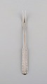 Early Georg Jensen Rope cold meat fork in silver (830). Dated 1915-1930.
