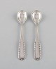 Two early Georg Jensen Rope salt spoons in silver (830). Dated 1909-1914.
