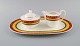 Paloma Picasso for Villeroy & Boch. "My way" porcelain sugar / cream set with 
serving tray. Colorful decoration. 1990s.
