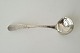 Antique Empire cream spoon in silver