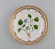 Royal Copenhagen Flora Danica lunch plate in hand-painted porcelain with flowers 
and gold decoration. Model number 20/3550.
