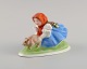 Herend figure in hand-painted porcelain. Peasant girl with piglet. Mid-20th 
century.
