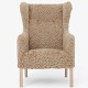 Roxy Klassik presents: Ejner LarsenModel 'Slotsholm' wingback chair in new lambswool 'Honey' with beech legs. ...