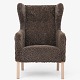 Roxy Klassik presents: Ejner LarsenModel 'Slotsholm' wingback chair in new lambswool 'Sahara' with beech ...