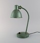 Adjustable desk lamp in original mint green lacquer. Industrial design, mid 20th 
century.
