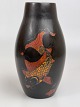 Asian lacquer vase. Motif of Koi fish / goldfish 
as well as sunrise over the sea (or sunset).