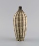 Körting Ceramics. Unique vase in glazed stoneware. Beautiful glaze in sand 
shades. Striped design. Germany, mid-20th century.
