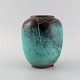 Richard Uhlemeyer (1900-1954), Germany. Vase in glazed ceramics. Beautiful 
crackle glaze in dark and turquoise shades. 1940s.

