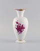 Herend Chinese Bouquet Raspberry vase in hand-painted porcelain. Pink flowers 
and gold decoration. Mid-20th century.
