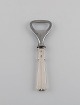 Hans Hansen silverware no. 7. Art deco bottle opener in silver (830) and 
stainless steel. Dated 1936.
