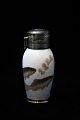 Rare Royal Copenhagen perfume bottle in porcelain with a fish motif, silver rim 
at the bottom (stamped)
RC#193/88A. 
Before 1923.