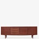 Roxy Klassik presents: Gunni Oman / Omann JuniorLarge sideboard in teak with four drawers and three doors.1 ...