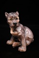 Dahl Jensen porcelain figurine of a Schnauzer puppy. H:13,5 cm. 
Marked Royal crown / DJ 1095. ...