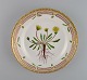 Royal Copenhagen Flora Danica salad plate in hand-painted porcelain with flowers 
and gold decoration. Model number 20/3573.
